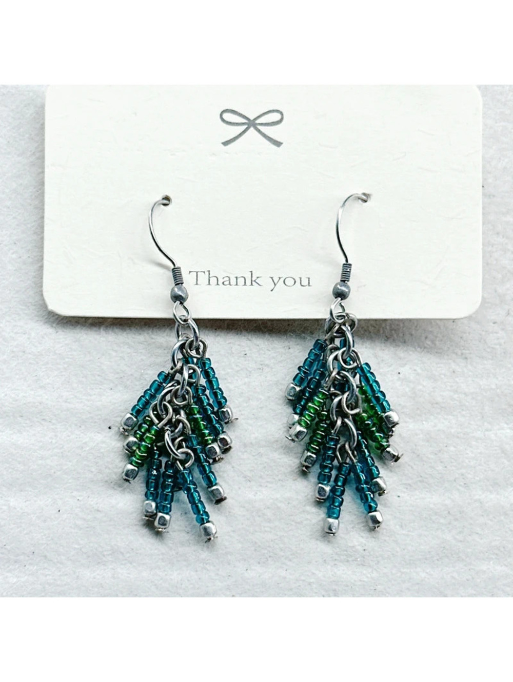 5482gc. Pewtertone Green Seed Bead Earrings